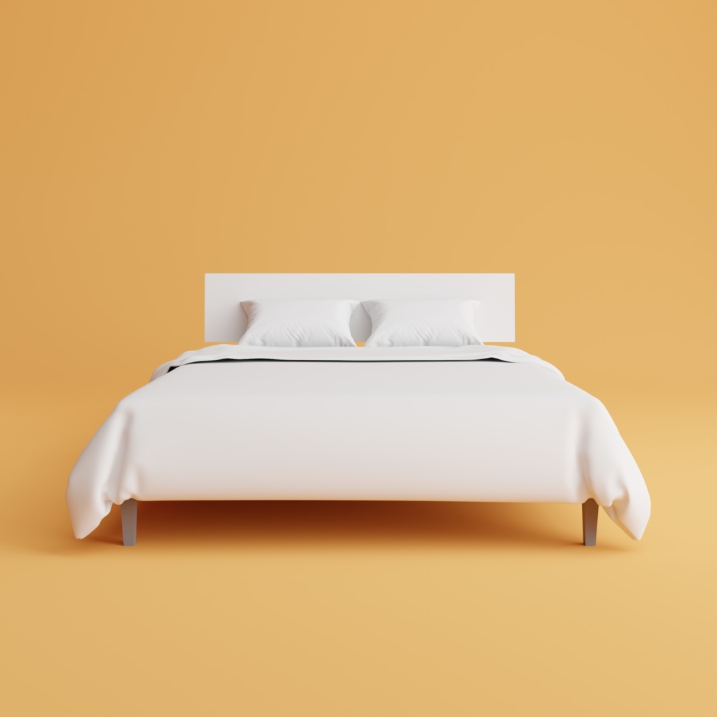 Minimalistische slaapkamer met een bed voorzien van een pocketvering matras en wit beddengoed, tegen een zachte gele achtergrond.